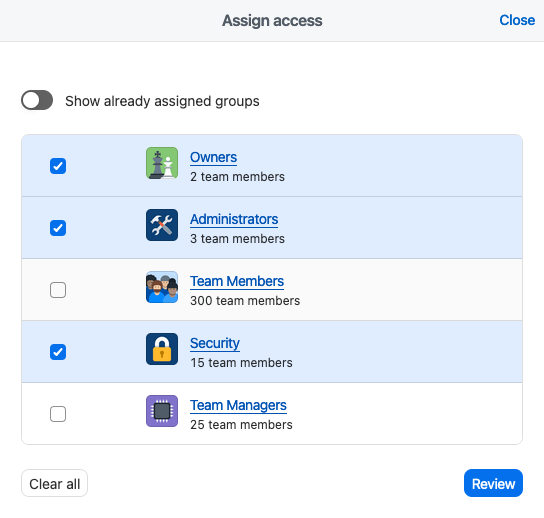 The SSO assign access window open with three groups selected to assign access to.