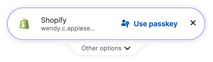 The prompt to sign in with a passkey using the 1Password browser extension.